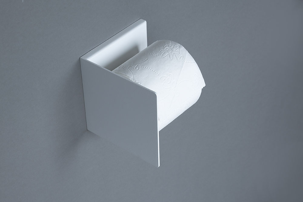biały wieszak na papier toaletowy